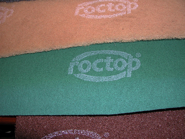 Advertising on abrasive surface for sanding.