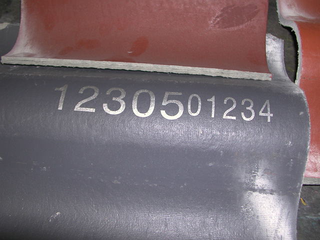 Marking of fiber cement corrugated sheets.