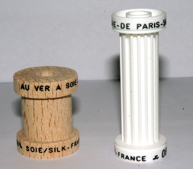 Quality and reference marking on thread spool.