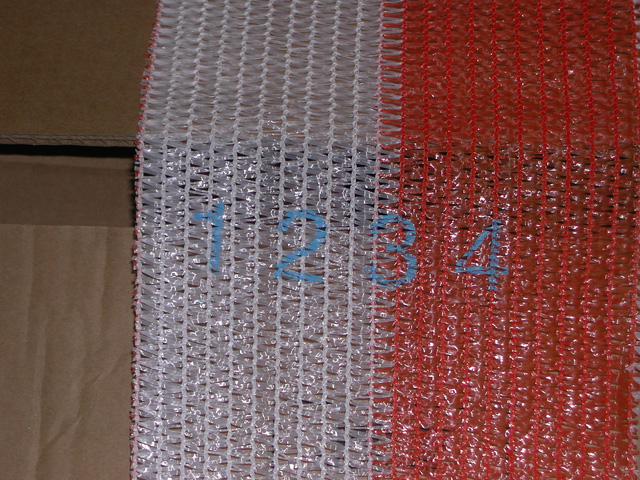 Marking on woven plastic.